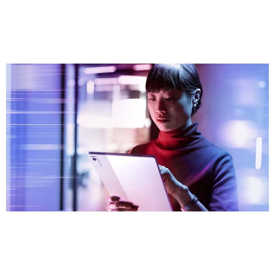 A woman looking at a tablet. Lenovo sale